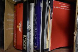 A carton of mainly car related books including Fiat 123, Classic Cars and 50 Years of American