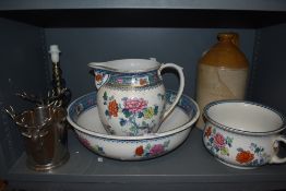 A Losol Ware Tuban commode dresser set AF, a stoneware flagon stamped Waighs Ltd, Kendal AF, a brass