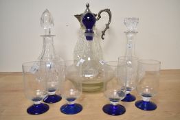 A selection of decanters including a ships decanter with six matching glasses, a Stuart Crystal