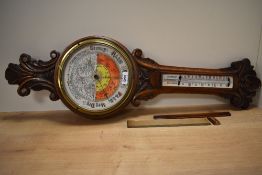 A vintage oak banjo barometer having hand painting to face AF.