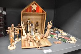 A vintage handmade African banana fibre palm leaf nativity scene sold along with a similar