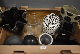 A large mid century hand blown handkercheif black vase, h22cm, sold alongside an oval glass vase