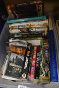 A carton of books of assorted genres including art, childrens books and novels, also includes a