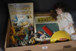 A small selection of vintage toys including a Fisher Price School Days Desk, a porcelain headed