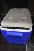 A large Coleman coolbox.