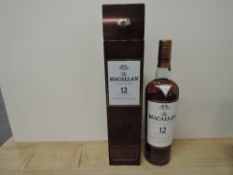 A bottle of The Macallan 12 Year Old Highland Single Malt Scotch Whisky, 40% vol, 700ml, in card