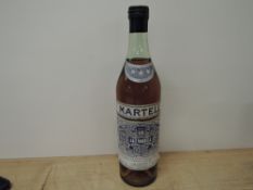 A bottle of 1960's/70s J & F Martell Three Star Very Old Pale Cognac, 70 Proof, no capacity stated