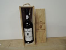 A bottle of Warre's 1987 Quinta da Cavadinha Vintage Port, 20% vol, 75cl, in wooden presentation