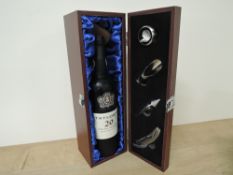 A bottle of Taylor's 20 Year Old Tawny Port, 20% vol, 75cl, in wooden presentation box with