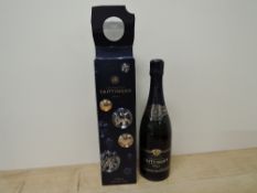 A bottle of Taittinger Champagne Prelude Grands Crus, 12.5% vol, 750ml, in card box