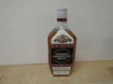 A bottle of 1980's Stewarts Cream of the Barley blended Scotch Whisky, 40% vol, 75cl