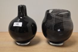 Two John Ditchfield iridescent art glass vases, of bulbous forms and in tones of purple with a green