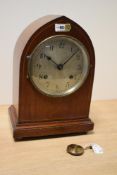 An early 20th Century mahogany cased mantel clock by New Haven, of lancet form with boxwood inlay,
