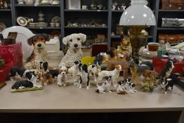An assortment of pottery and other animal studies including a reclining German shepherd, border