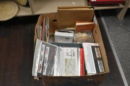 A box containing a large quantity of stamps, to include Sir Isaac Newton, The Sixtieth Birthday of