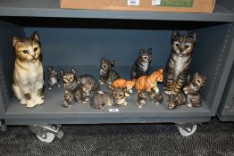 A group of vintage Harvey Knox ceramic tabby cat's, largest h29cm, sold together with a pair of