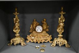 A 19th century French gilt metal figural striking mantel clock, the movement marked Vincent & Cie