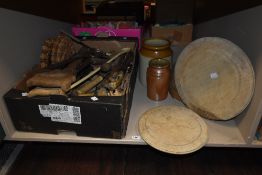 A good selection of meat knives, butcher saws, wooden chopping boards, stoneware pots ect