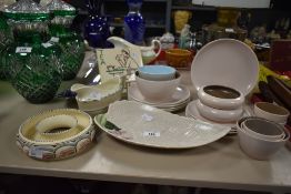 A collection of various ceramics, to include a Crown Ducal gravy dish, a Totem bowl, a part Poole