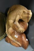 A large Komodo dragon sculpture, hand carved from sheesham wood, h52cm