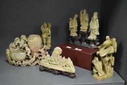 A small collection of Chinese carved soapstone, to include carved immortals, chinoiserie