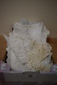 A small assortment of crochet doilies etc.