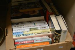 A box containing various books, to include John Mortimer and autobiography, ect.