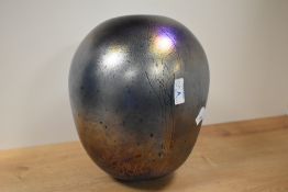 A large John Ditchfield iridescent petroleum glass vase, of ovoid form and having a naturalistic