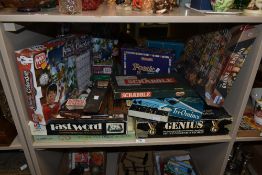 A selection of board games, some in the original packaging, to include Scrabble , The Brands that