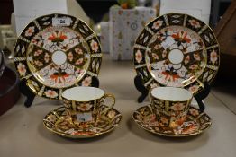 A Royal Crown Derby Imari pattern part dessert service, to include cup, saucer and plate, makers