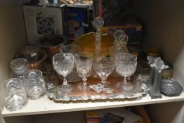An assortment of silver plated, brass and pewter ware, to include candletsicks, serving tray,