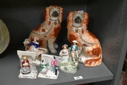 A pair of late 19th century Staffordshire pottery Russet Spaniel dogs, h26cm, sold alongside four