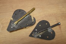 Two unusual metal heart-shaped knotting 'sticks'
