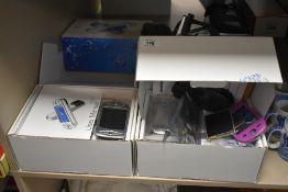 Two 02 XDA II mobile phones, one in dismantled state, both with boxes and manuals etc.