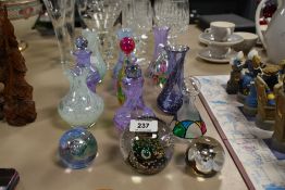 A group of perfume bottles, vase's and paperweights, to include (eleven Caithness glass perfume bot