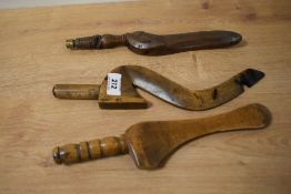 Three 19th century carved wooden wing form knitting sticks.