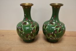 A pair of Chinese cloisonne enamel baluster vase's, decorated having maroon, white and lime green