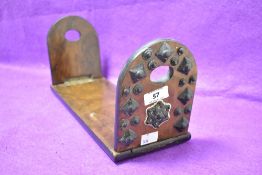 A Victoria walnut Gothic style folding book trough, having brass stud decoration, L33cm.