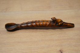 A 20th century Chinese carved boxwood tea spoon, hand carved depicting a lotus leaf frog, L19cm