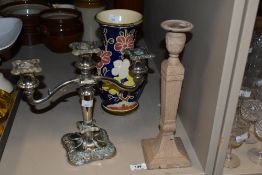 A heavy Victorian Neo Classical style cast iron candle stick, having classical motifs, H30cm, sold