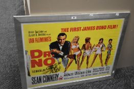 A framed reproduction James Bond film poster featuring Dr.No, printed 2002, L87cm x H67cm.