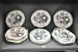 A group 19th century William Brownfield dessert plates, having hand coloured green fruit and foliage
