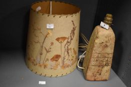 In the manner of Bernerd Rooke - A mid-century stoneware studio pottery lamp with shade, decorated