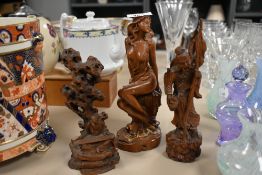 Two vintage Chinese carved boxwood sculptures depicting fisherman with his catch and a seated