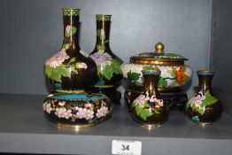 A group of Cloisonne enamel ware, to include a pair of baluster vases standing on wooden pedestal