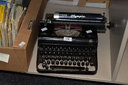 A early 20th century black German Olympia Elite typewriter, w27.5cm.