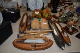 Two pairs of vintage wooden clogs, sold alongside wooden loom shuttles in various sizes etc.