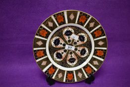 A Royal Crown Derby 1128 Imari pattern bone china plate, printed factory marks to underside, date