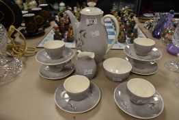 A mid-century Royal Doulton tea service in Frosted Pine pattern, to include tea pot, milk jug, sugar