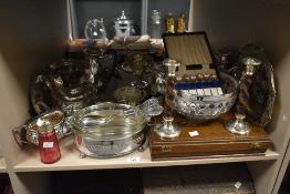 A collection of early 20th century silver plated tea pots, largest h26cm, a pair of barley twist